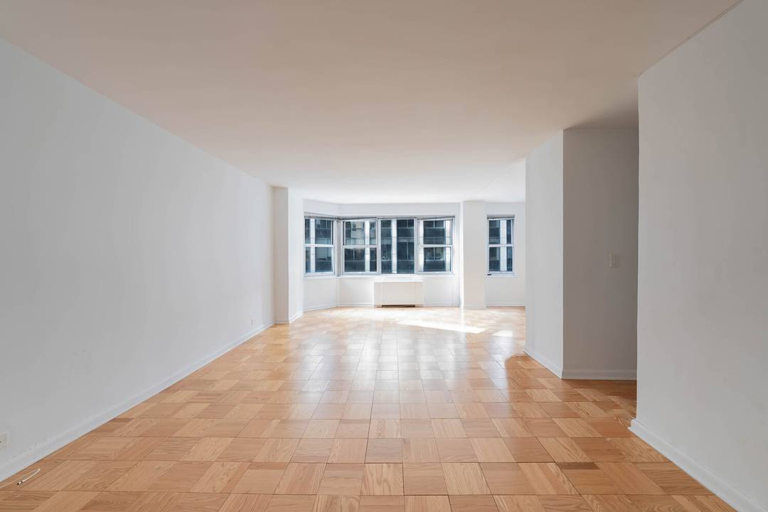 Situated on the southeast corner of 77 West 55th Street, we welcome you to this spacious and sunny alcove studio in a full service luxury condominium located in the heart ...