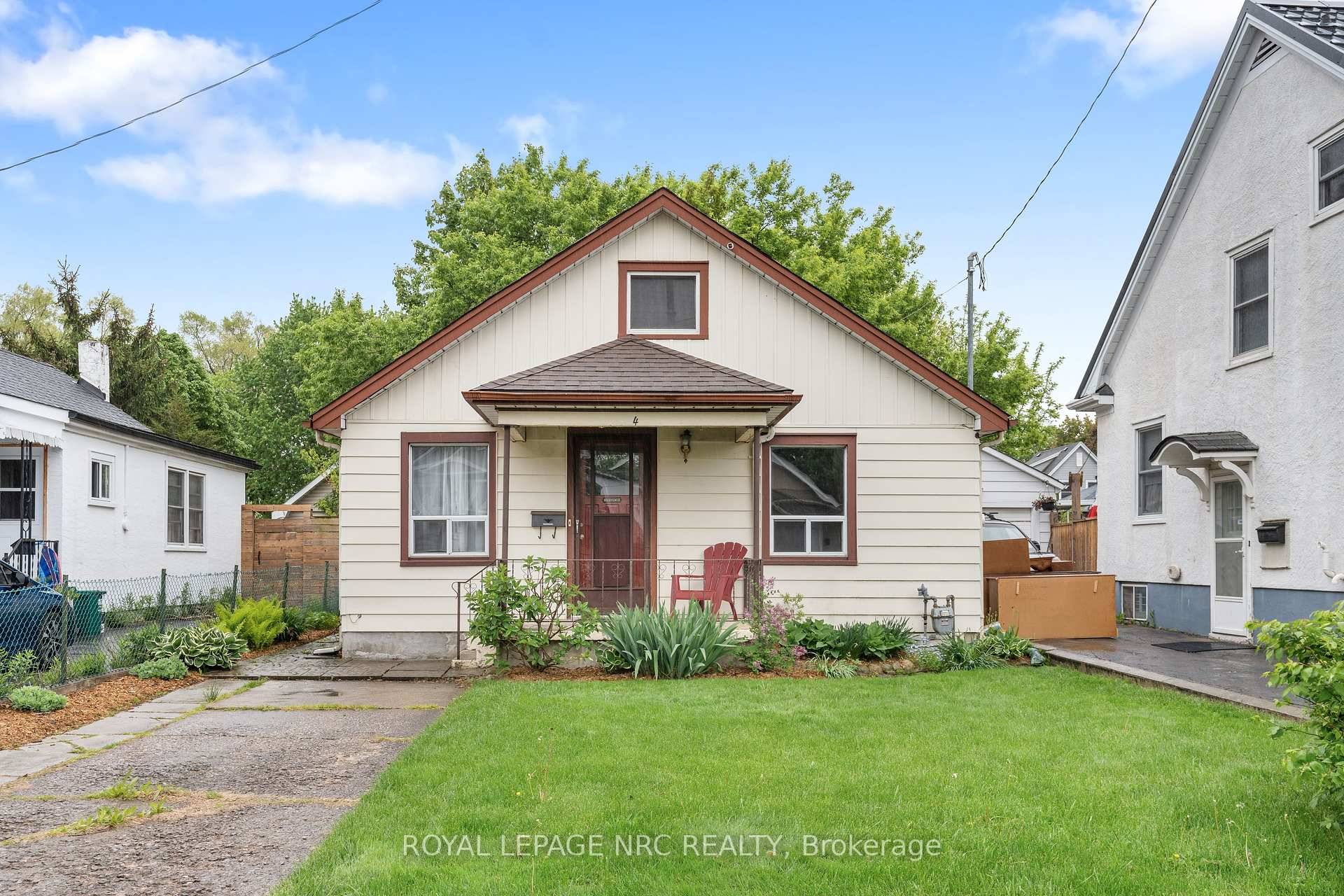 Here is a very charming BUNGALOW starter or investment property with lovely curb appeal.