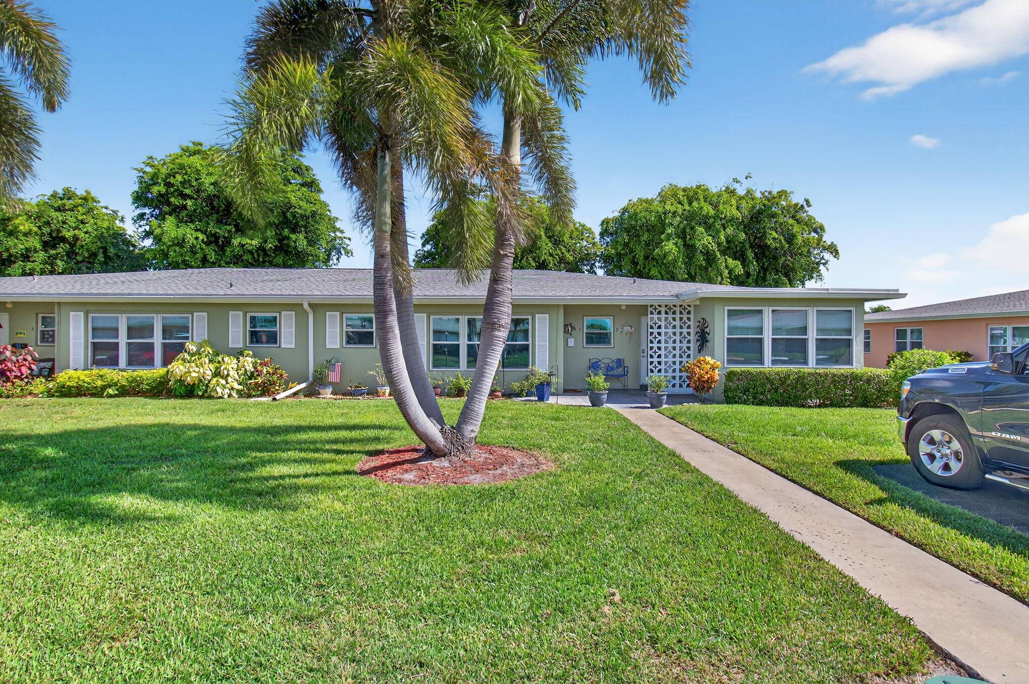 Enjoy life in this fully updated one story villa featuring new stainless steel appliances, a 2024 roof, and tile throughout.