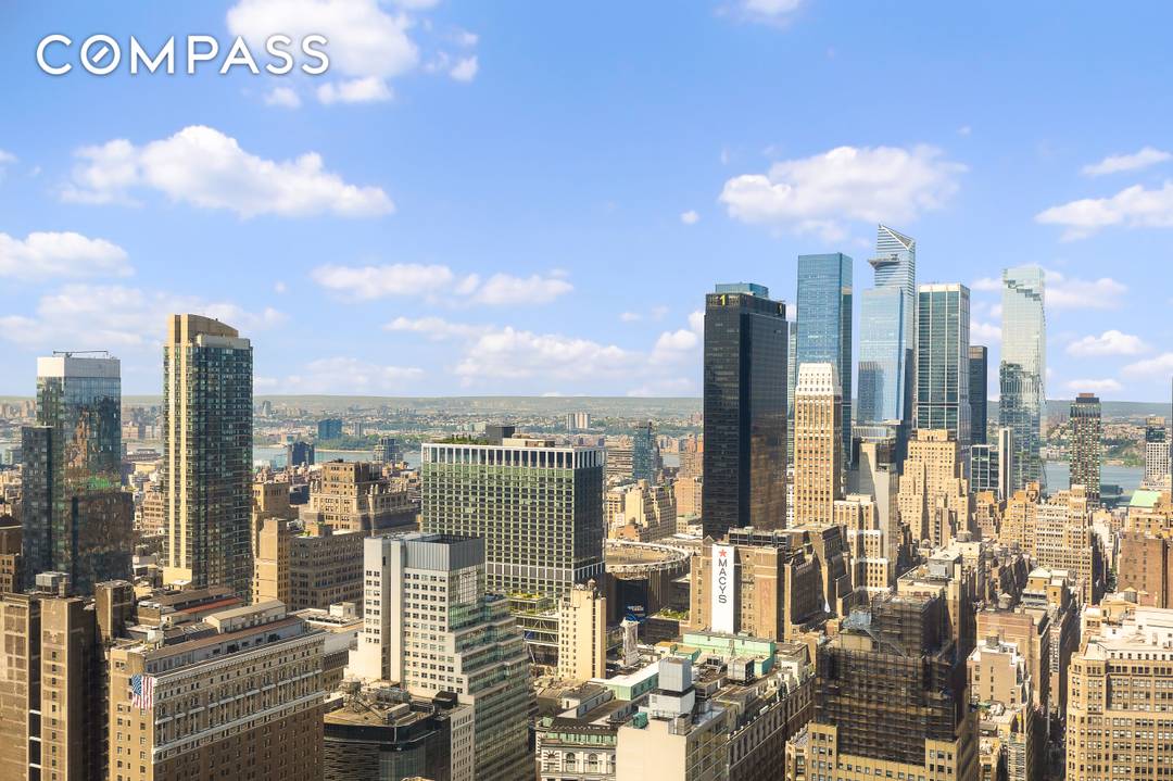 Perched high above the city, Residence 50F at 400 Fifth Avenue offers refined living defined by sweeping skyline views and thoughtful design.