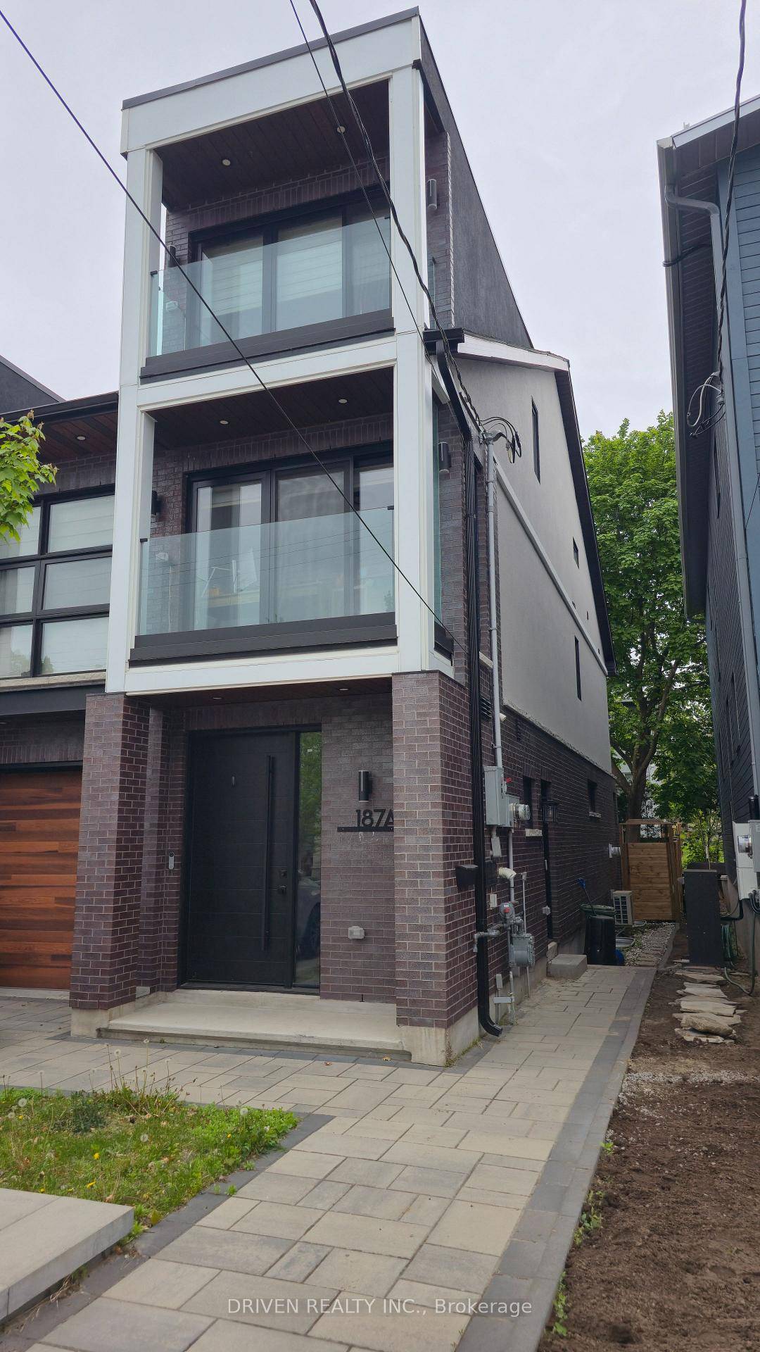Discover this beautifully designed lower level SMART apartment, complete with its own private side entrance, nestled in the prestigious neighborhood of Champlain Park.