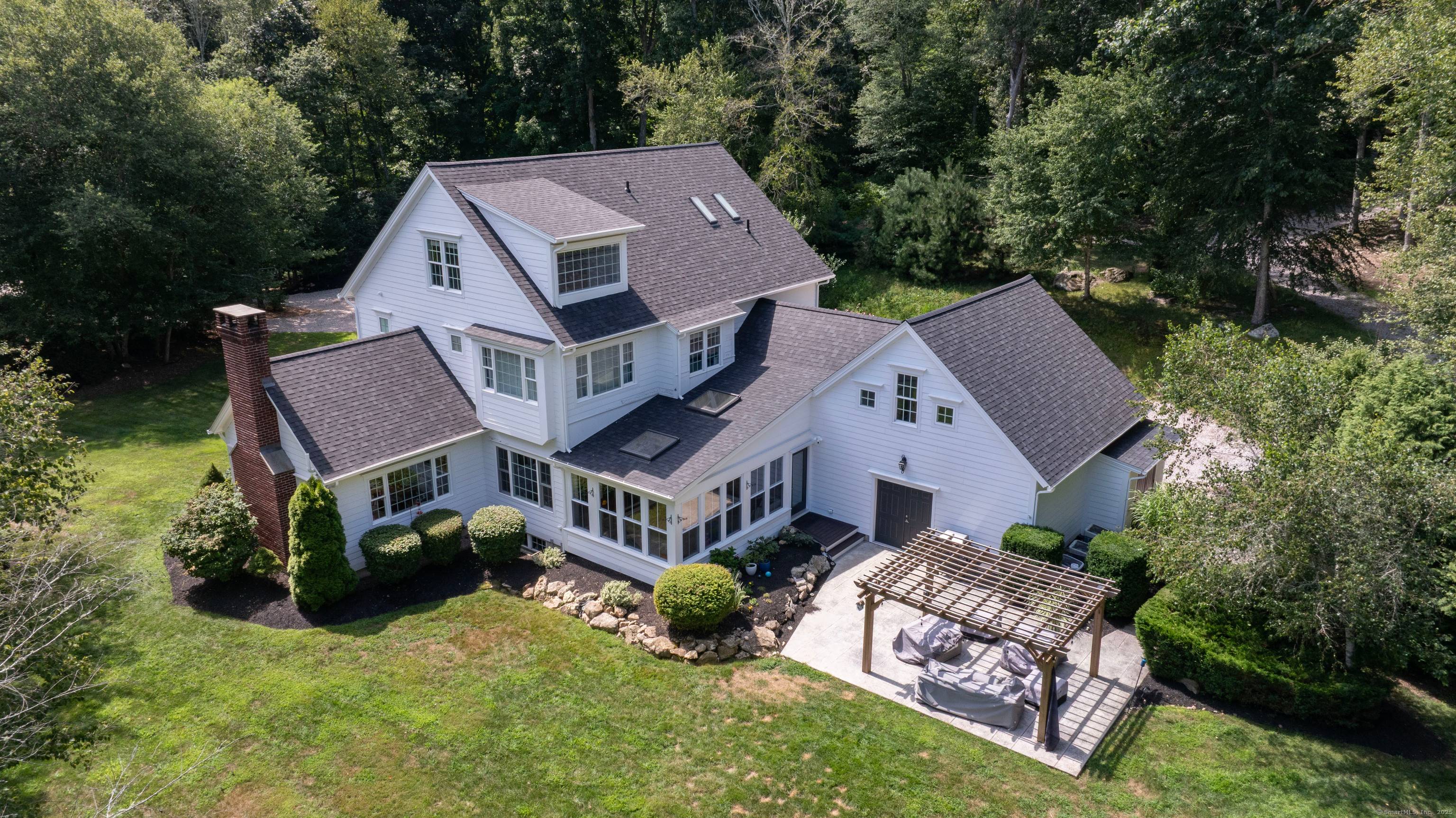 Gorgeous Country Estate Perched on 10 private acres bordering Wyassup Brook.