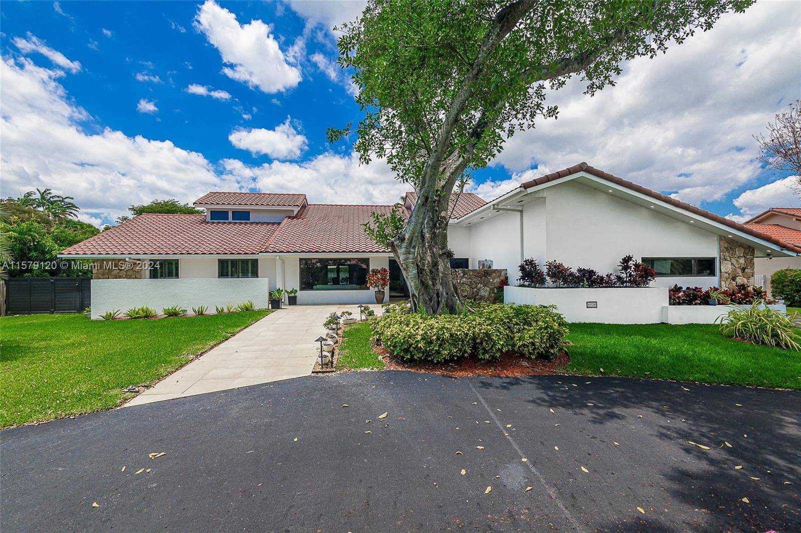 Recently Repriced ! Experience luxury living in this magnificent 4, 578 SF, 6 bedroom, 4 bathroom residence, ideally located in Galloway Glen Estates.