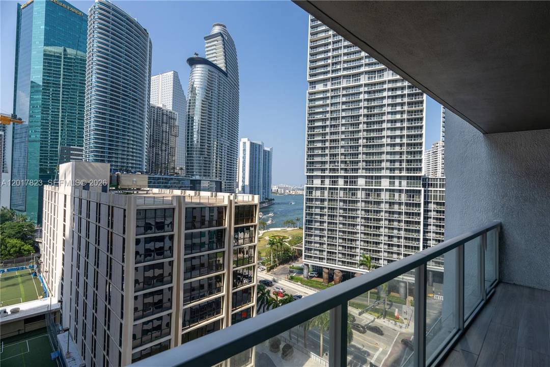 Remodeled 2 2 at 500 Brickell, move in ready with quality finishes, Porcelanosa tiles across the unit and large windows in every room.