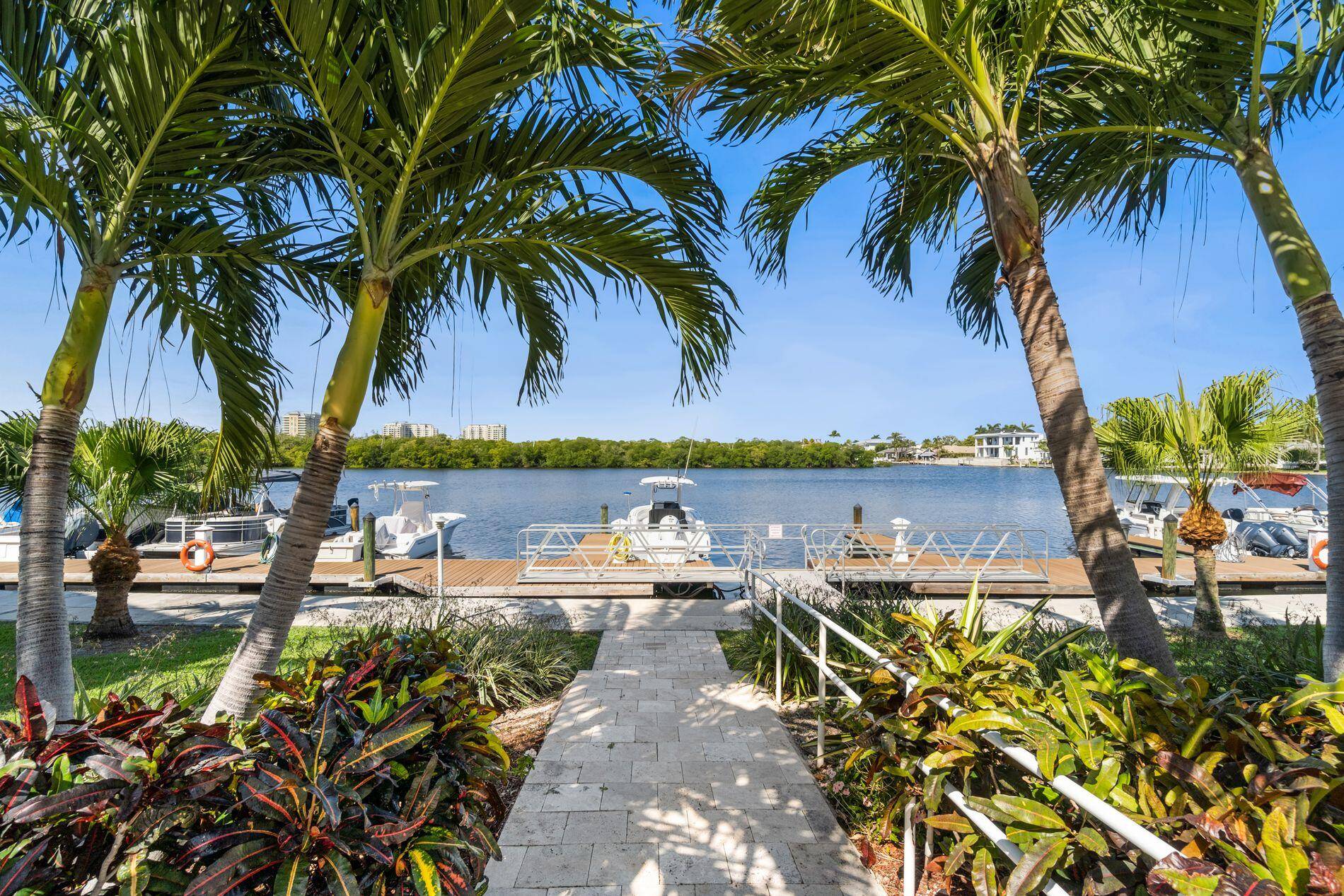 Experience coastal living at its finest in this chic, fully updated 2 bed, 2 bath end unit condo in the coveted Ocean Ridge community !