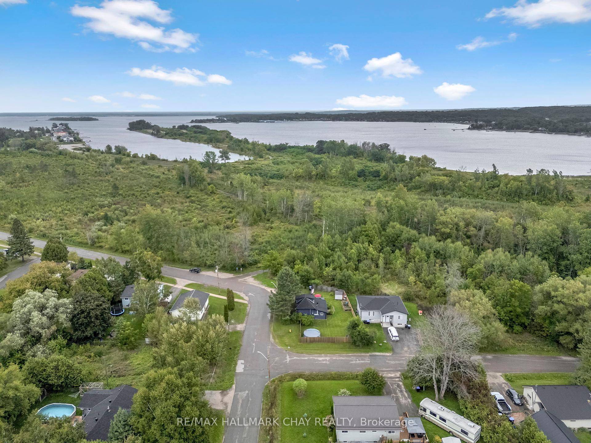 Tucked onto a peaceful corner lot, this charming 1.