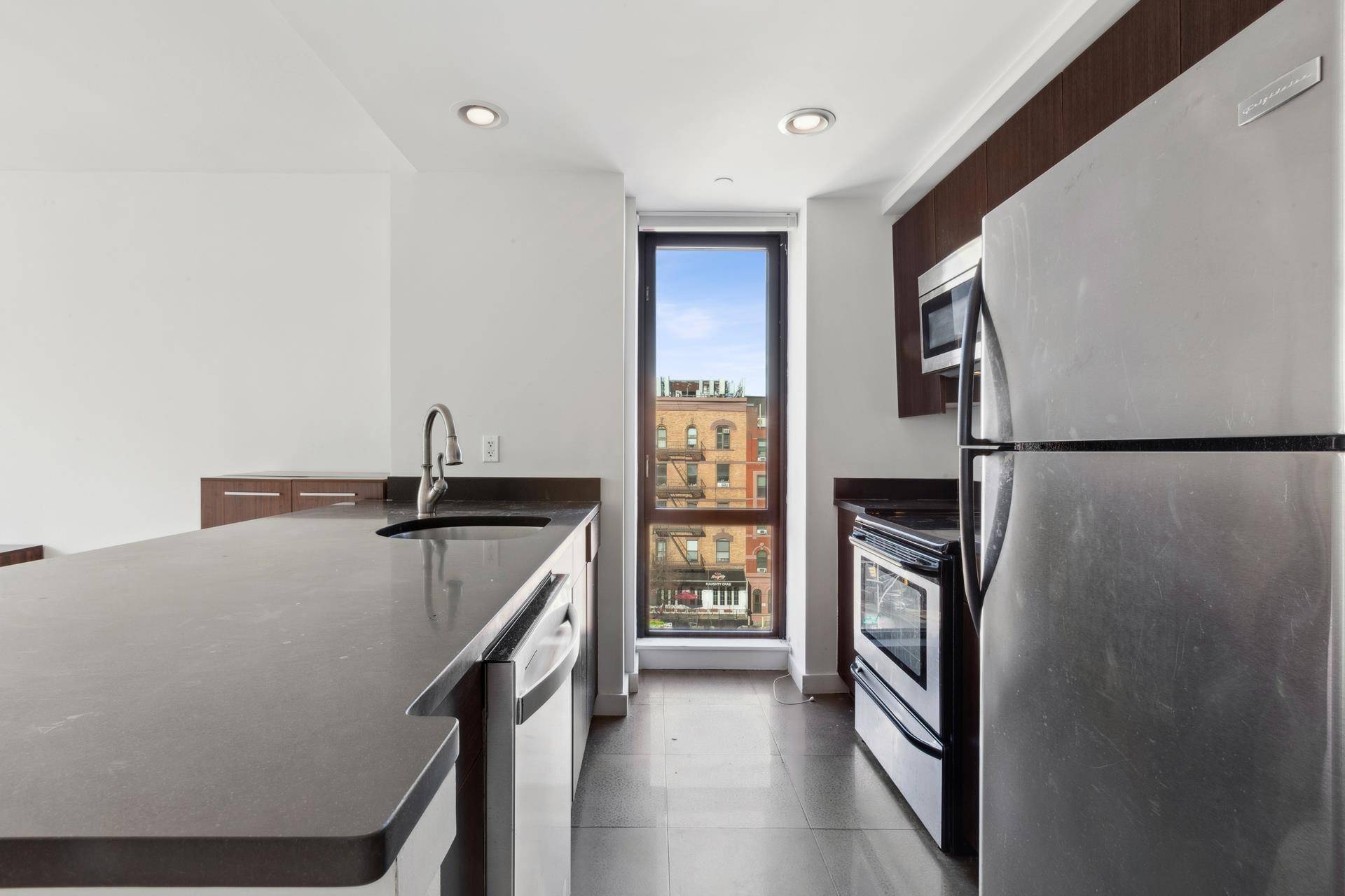 Welcome to Apartment 5B at 1595 Lexington Avenue, located in the Copper Hill Condominium.