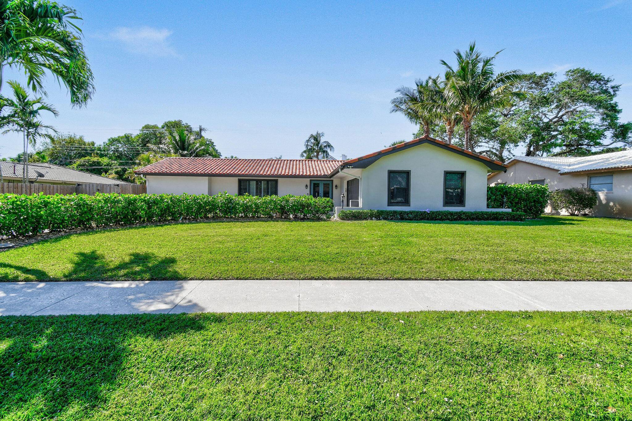 Experience the charm of coastal living with this beautifully renovated home in the picturesque community of Juno Isles.