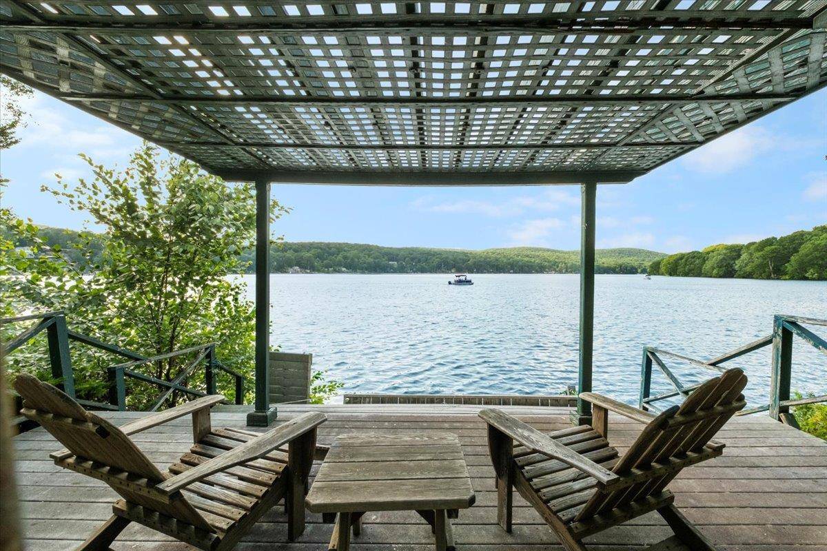 Welcome to This Stunning Center Hall Colonial on Whaley Lake.