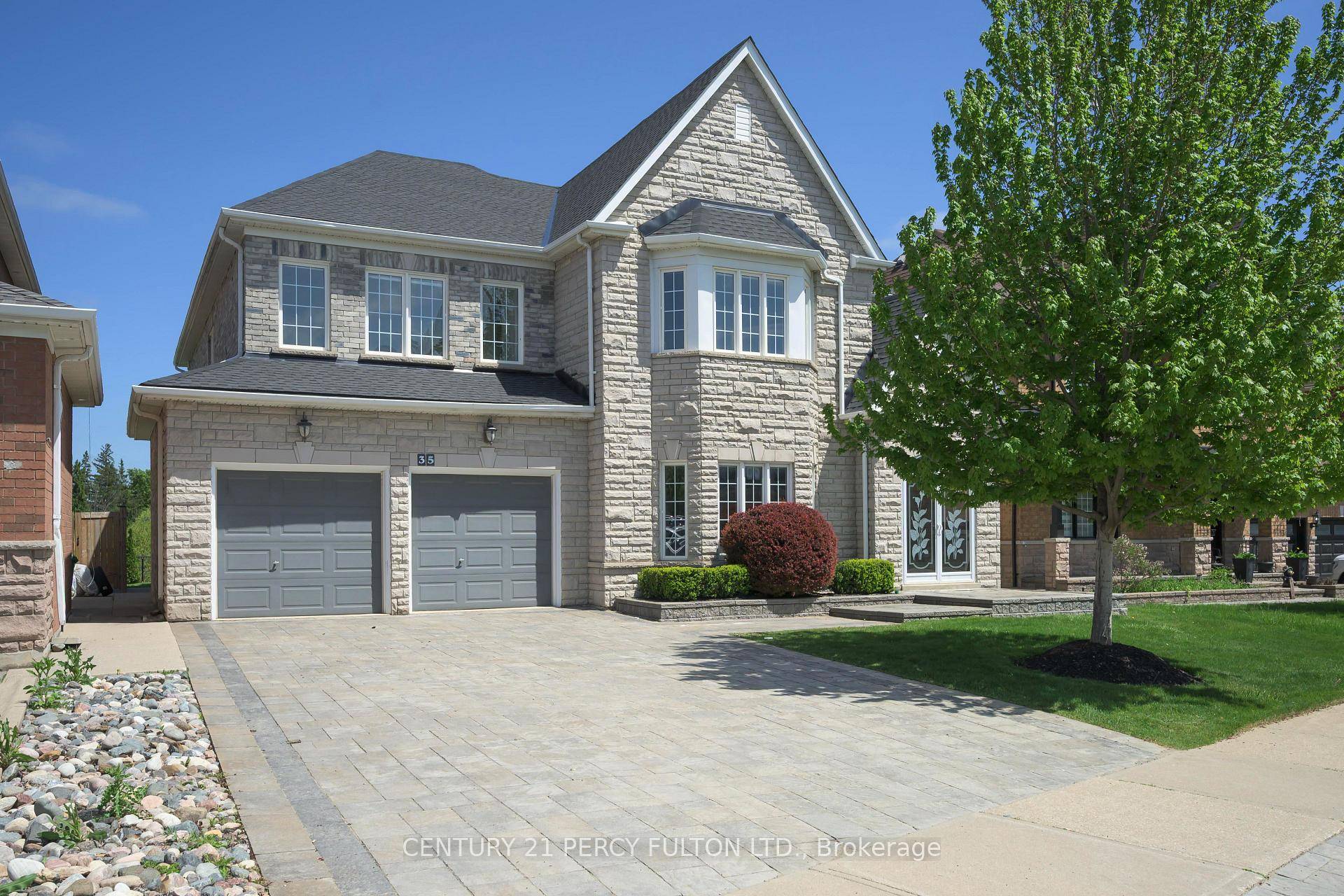 Welcome to this beautifully renovated 4000 sqft home backing onto a rare ravine lot in the prestigious Vales of Castlemore community.