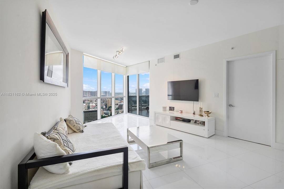Experience luxury living at Trump Royale in Sunny Isles Beach with this beautifully upgraded 1 bed, 1.