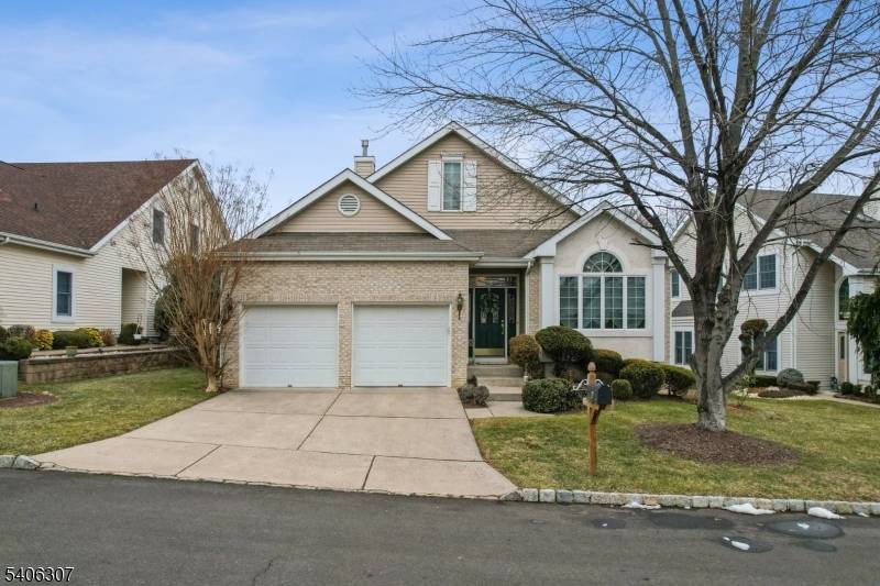 Welcome to this spacious ranch nestled in one of Monroe Township's most desirable 55 communities !