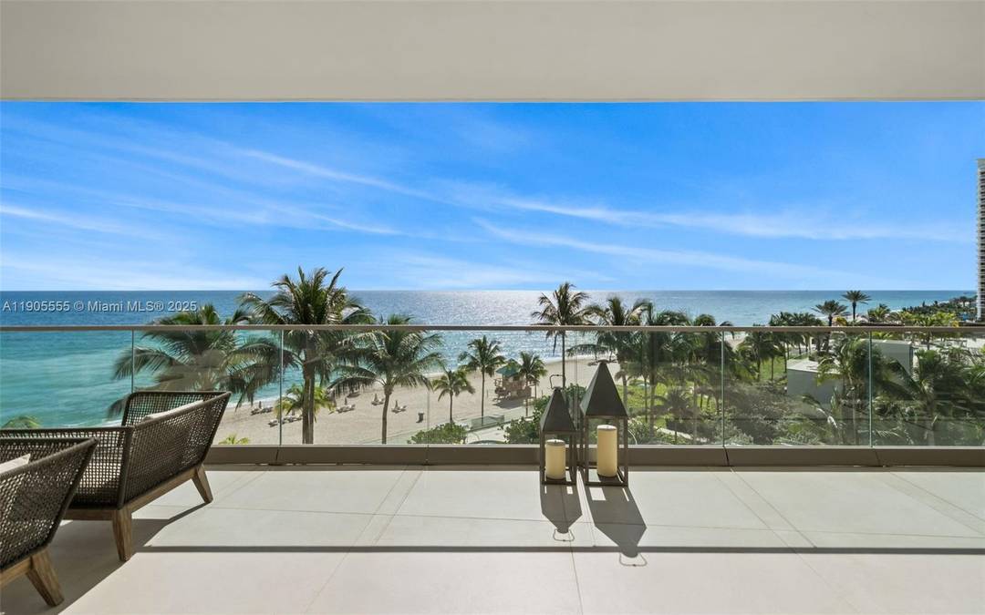 Experience refined oceanfront living in Residence 401 at the prestigious Residences by Armani Casa.