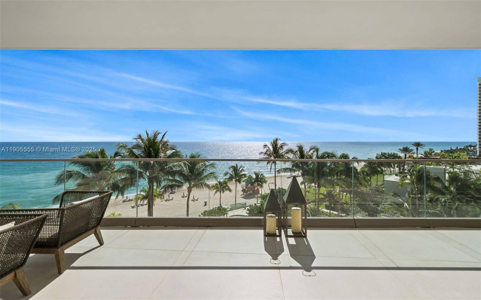 Experience refined oceanfront living in Residence 401 at the prestigious Residences by Armani Casa.