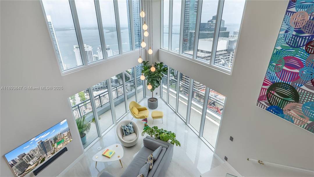 Experience sky high living in this exquisitely remodeled 2 story duplex soaring above Brickell on the 42nd floor.