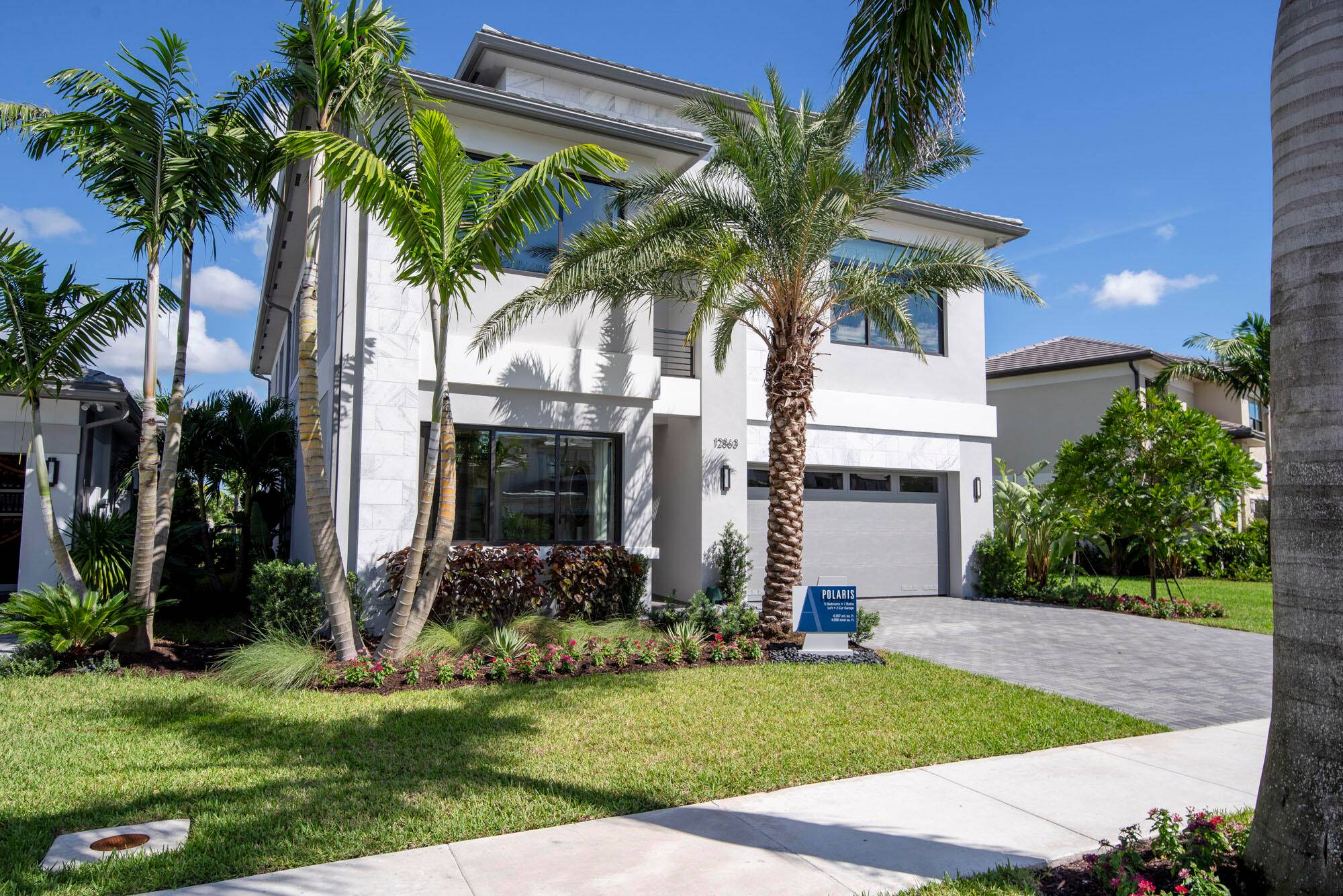 Experience the height of luxury in this new construction 5BR 7BA home, built by one of Palm Beach County's premier luxury builders and sitting on a large lot with beautiful ...