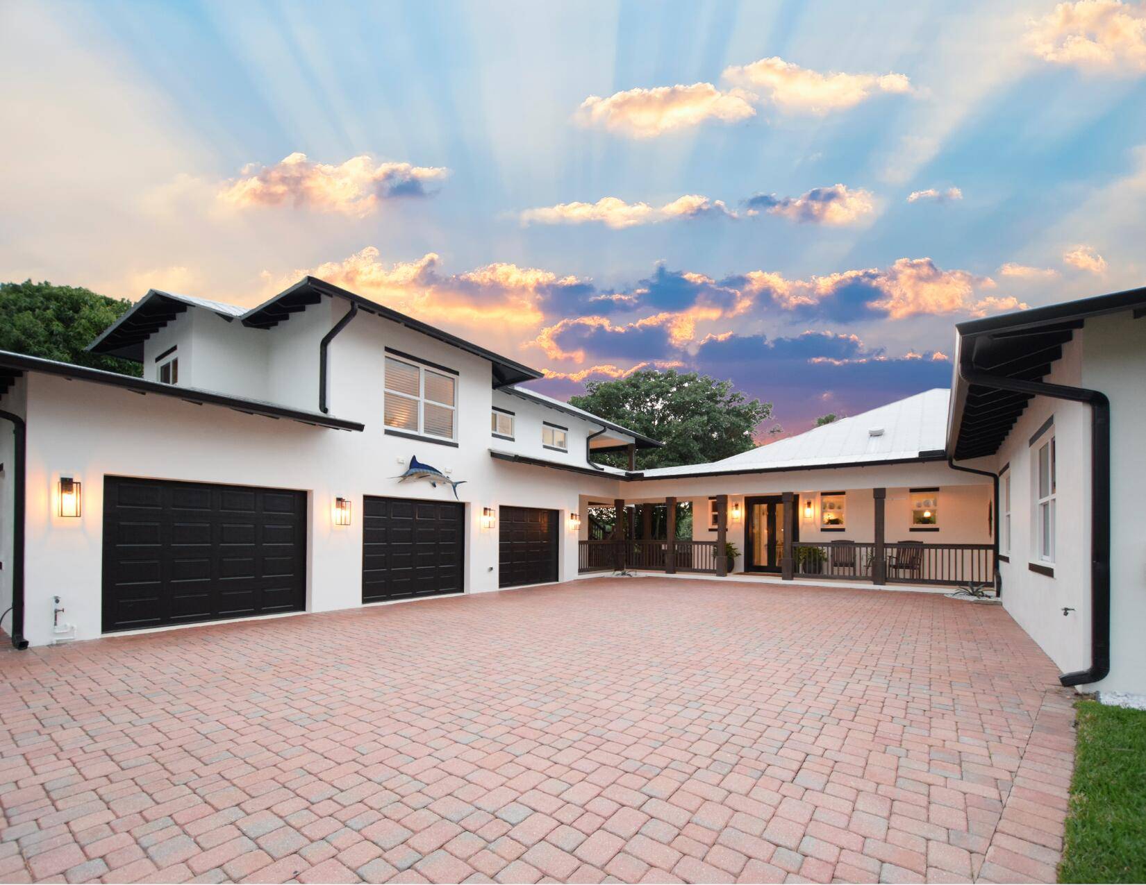 Welcome to 'Latitudes', Your in town compound with deep water ocean access for larger vessels, oversized garage for your vehicles and toys, spacious guest house for visitors or renters, and ...