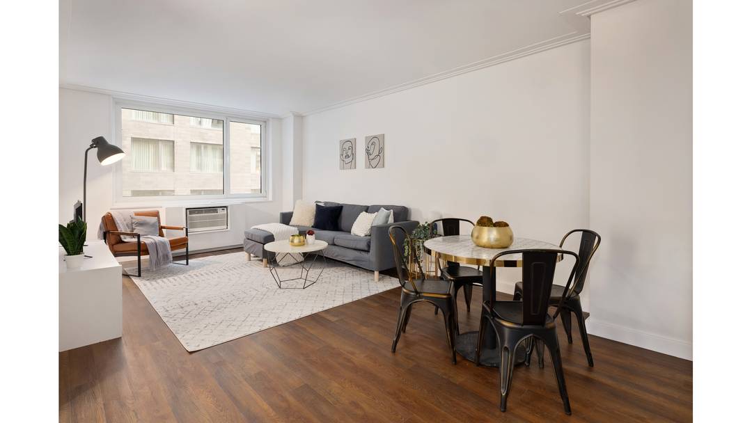 Spacious south facing one bedroom, one bathroom apartment in a luxury full service building located in Midtown West.