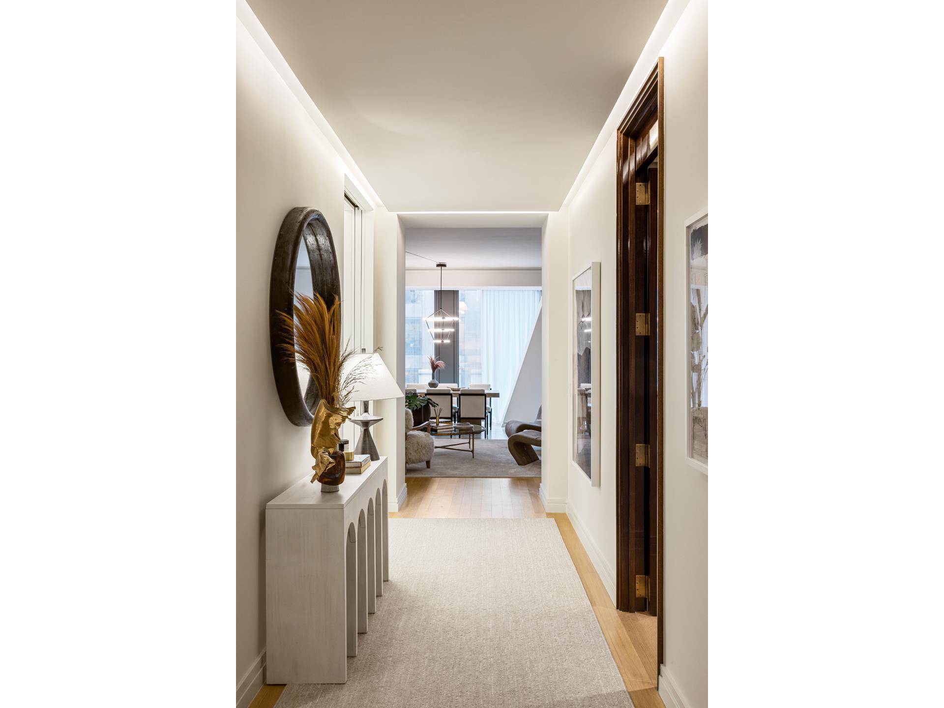 Combining superb sophistication and craftsmanship with the intimate feeling of home, Residence 34C at 53 West 53 comprises 2, 506 square feet, offering three bedrooms, three and a half bathrooms, ...