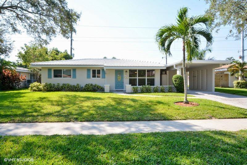 Immaculate and well maintained 2 2 plus Florida room in east Boca just minutes to the downtown area and beaches.