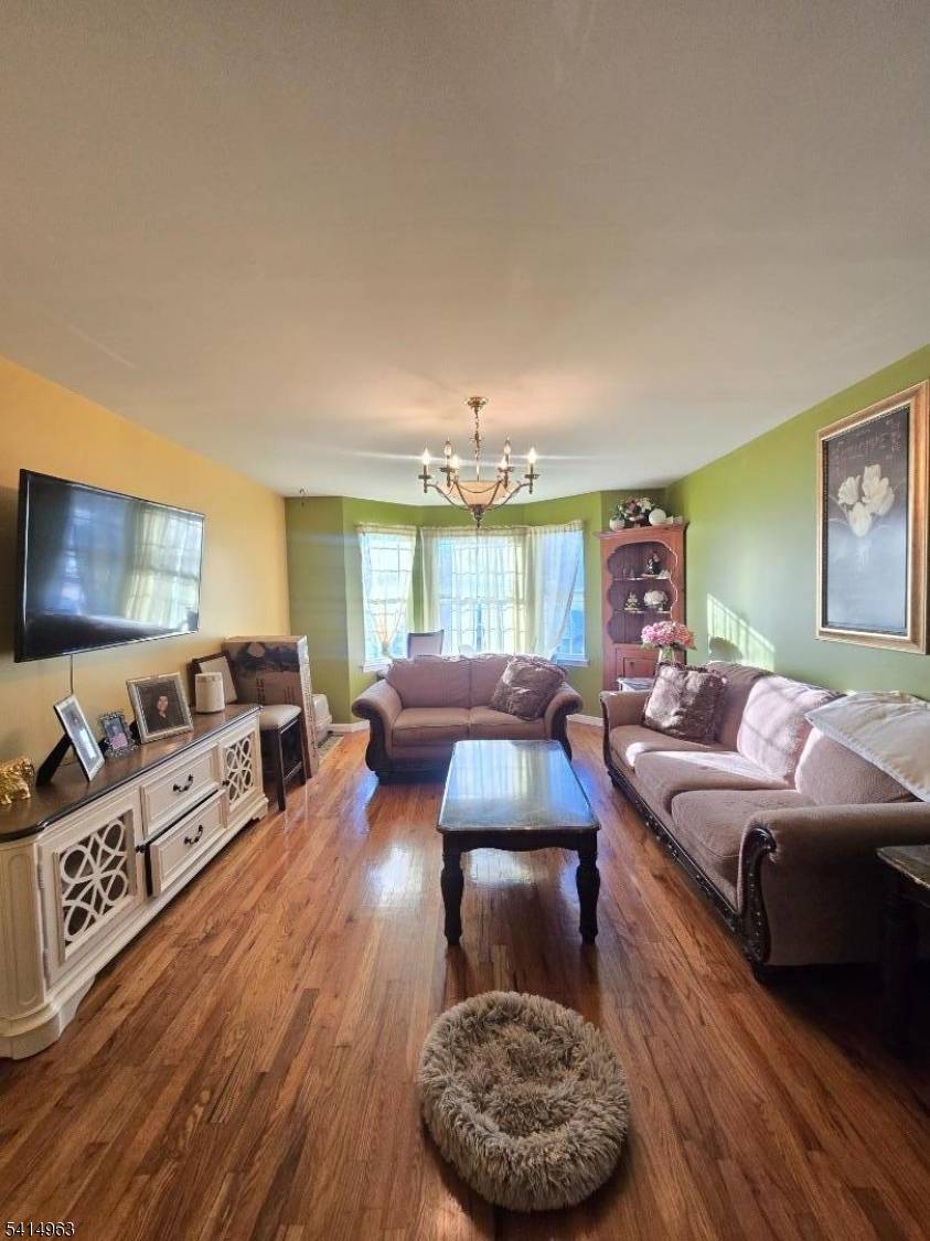 Charming well maintained multi level home featuring a distinctive design with an attractive brick exterior and large bay style windows that provide plenty of natural light.