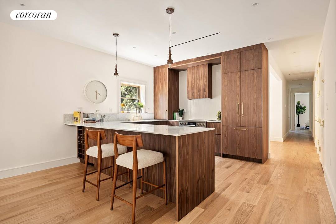 Welcome to 148 Clinton Avenue, where three very rare homes offer grand loft like living spaces with the warmth and intimacy of an historic townhouse.