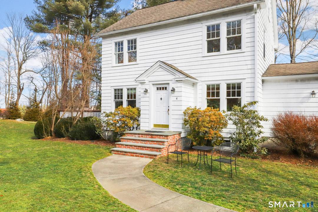 Sunny Colonial in convenient south Newtown location on level landscaped 1.