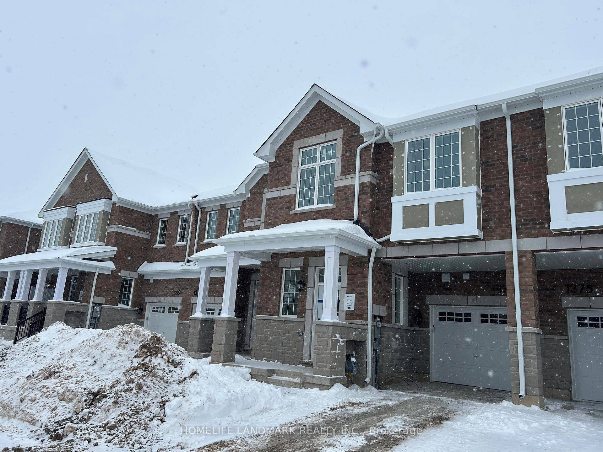 This stunning, newly built 2 story townhome offers 4 spacious bedrooms and 2.