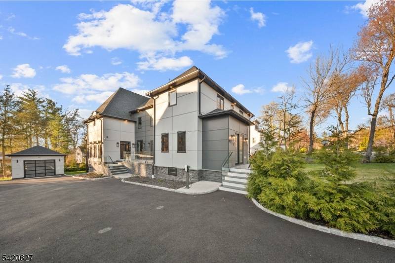 Experience luxury living in this brand new Modern French Chateau with over 8, 500 sq ft of meticulously crafted space across four levels featuring soaring ceilings and exquisite attention to ...