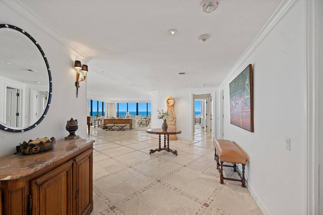 Rarely available and beautifully situated in one of Palm Beach's most exclusive oceanfront buildings, this 3BR 4.