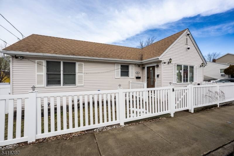 Welcome to this charming three bedroom, two bath ranch style home located in desirable Woodland Park.