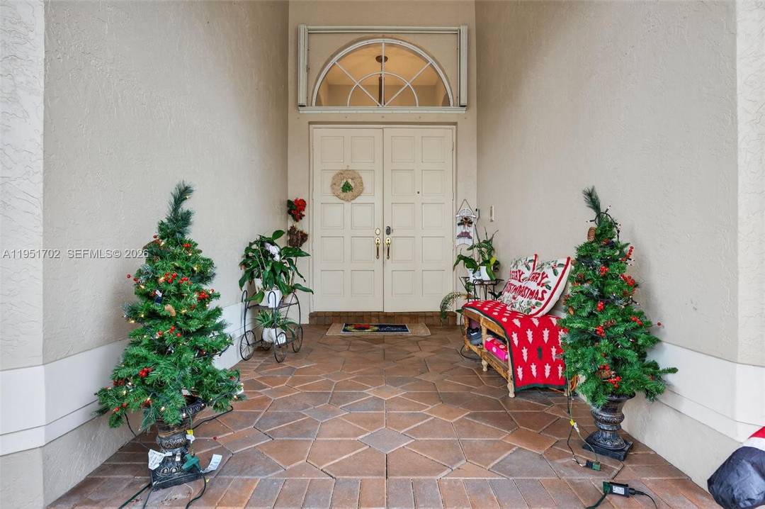 Stunning luxury residence set on an expansive 19, 197 SF waterfront lot and cul de sac in the exclusive gated community of The Landings.
