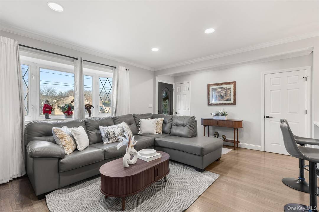 Tastefully Beautiful renovate ranch in desirable Three Village School District, featuring 3 bedrooms and 2 full bathrooms, with a fully finished basement offering outside and inside access.