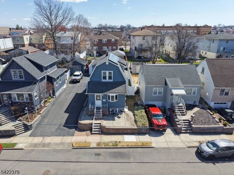 Bright, beautifully updated and complete with a private yard and garage !