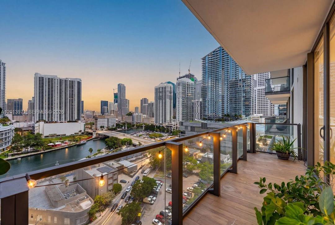 Luxury corner 3BR 3. 5BA residence at Rise Brickell City Centre with oversized wraparound balcony 568 SF offering views of Miami River, and Downtown skyline.