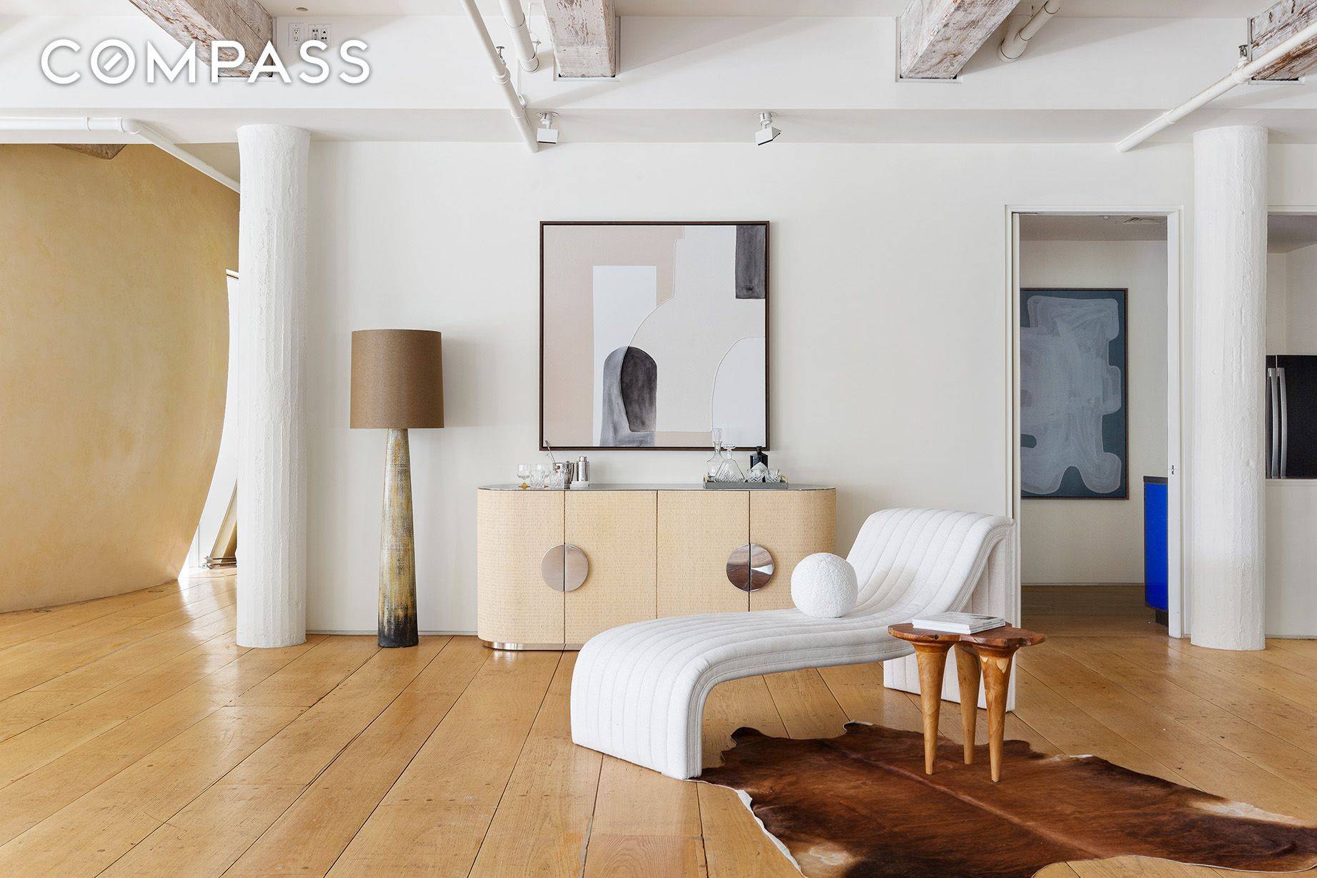 Overlooking the tree tops of Hudson Square's Spring Street Park comes this enormous corner loft, overflowing in authentic, historical details.