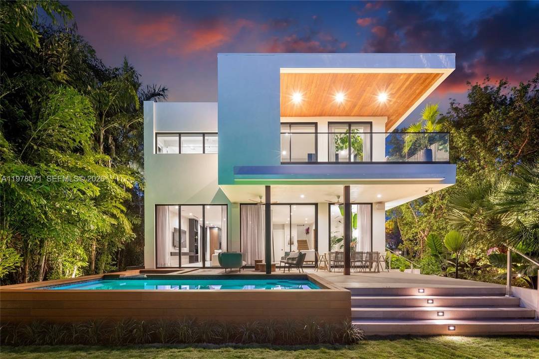 Recently reimagined with a comprehensive landscape and outdoor living transformation by Nielsen Landscape Architecture, this refined modern residence on Miami Beach s prestigious North Bay Road now offers a level ...