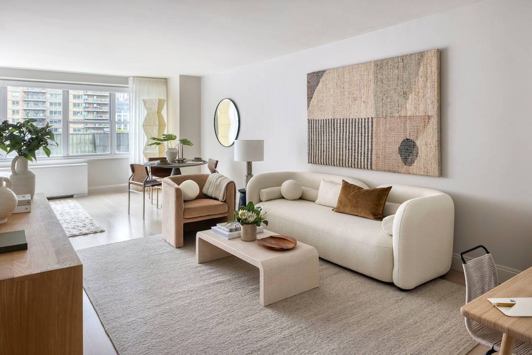 Enjoy eastern exposure and Broadway views from this studio residence at 155 West 68th Street.