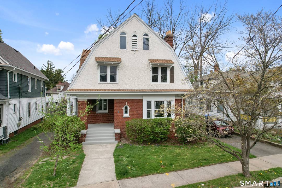 Spacious and beautifully updated, this 4 bedroom, 1.
