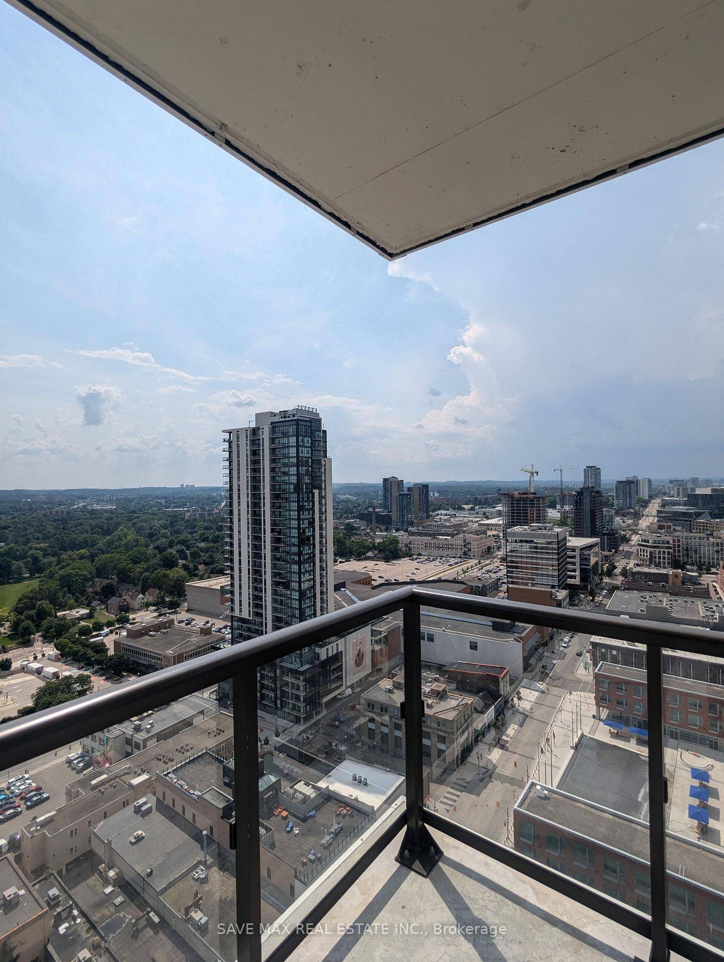 Okay Google, show me a huge 2 bed 2 bath corner unit with wrap around balcony views less than a 5 minute walk to your downtown Kitchener office !