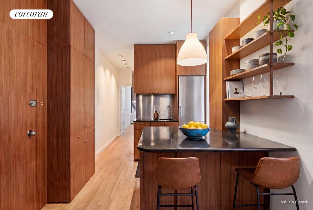 Welcome to Unit 4CD at 99 Avenue B, where modern elegance meets historic charm in the vibrant heart of the East Village.