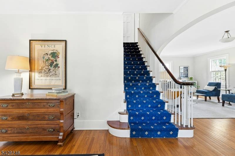 Beautiful Center Hall Westfield Colonial, exuding timeless charm and traditional details high ceilings, beautiful oak flooring, classic moldings, meticulously maintained, and flooded with natural light.
