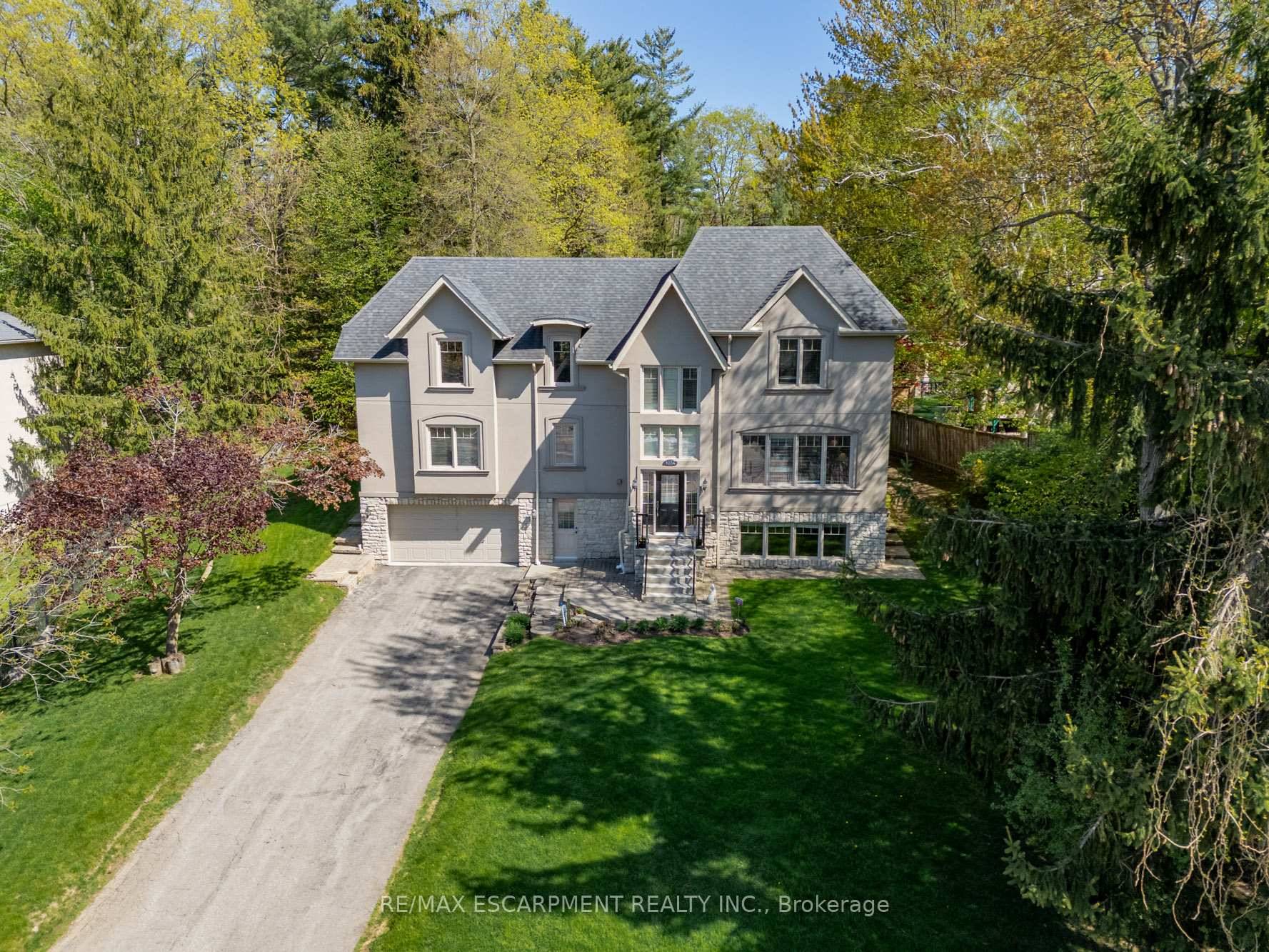 This beautifully designed home is ideally located just steps from the lake, public transit, and bike trails, surrounded by private estates.