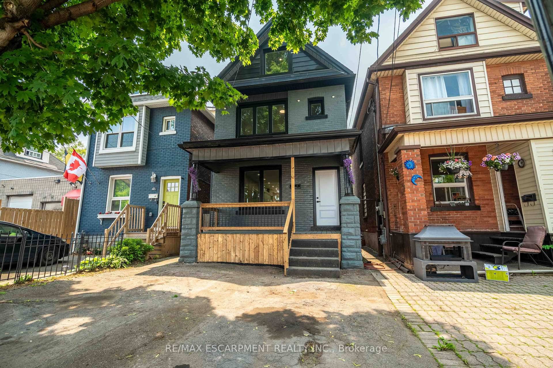 A stunningly updated, 2. 5 story brick home at 44 Lloyd Street has just been listed, offering the perfect blend of classic charm and contemporary flair.