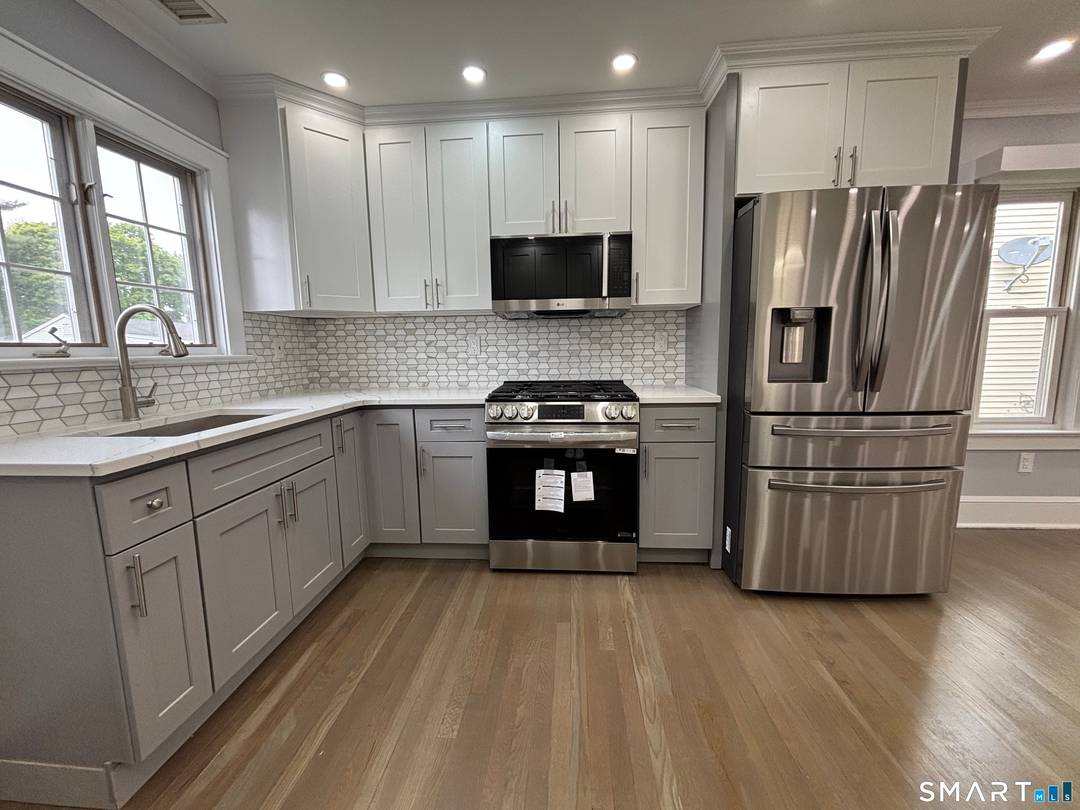 Move in ready, fully renovated 4 bedroom rental featuring a bright, open floor plan and a brand new granite kitchen with a center island.