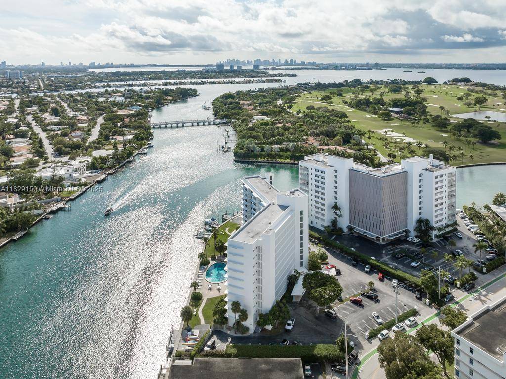 Welcome to The Mediterranean, a MiMo waterfront condo in Bay Harbor Islands by architect Herbert Mathes.