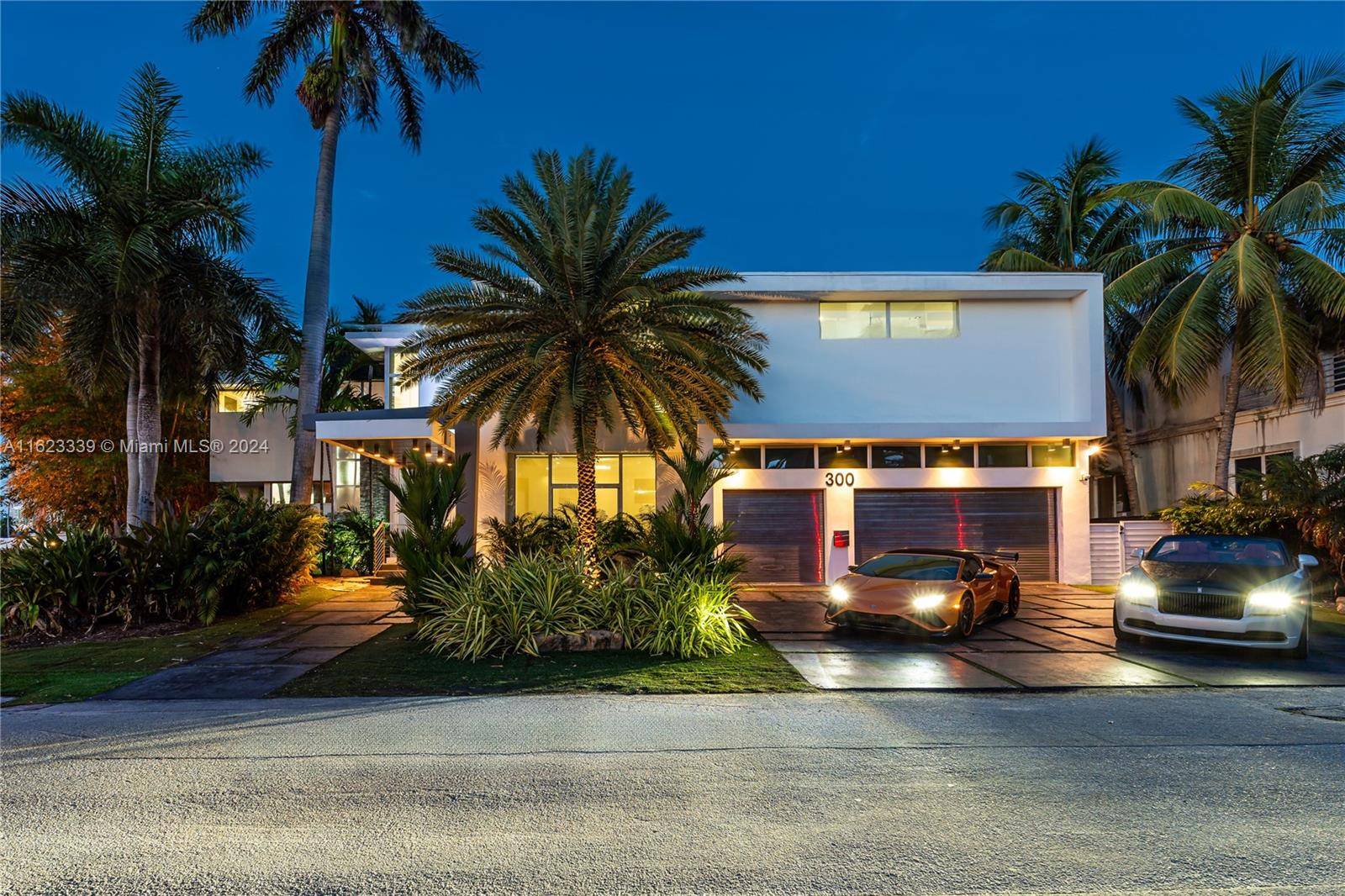 Custom designed modern residence in Las Olas Isles, with a wide canal, dock up to a 90' yacht.