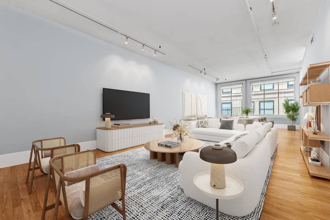 This sun drenched full floor loft captures the essence of authentic Tribeca living.