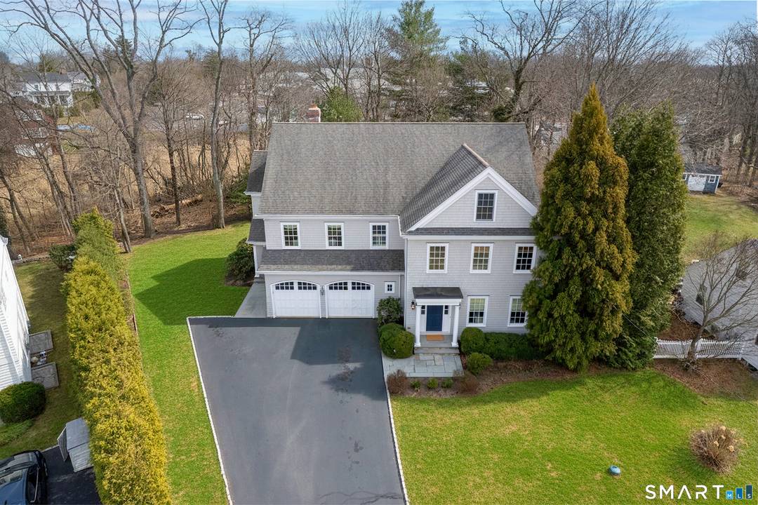 Welcome to 25 Patricia Lane, where timeless elegance meets modern convenience.