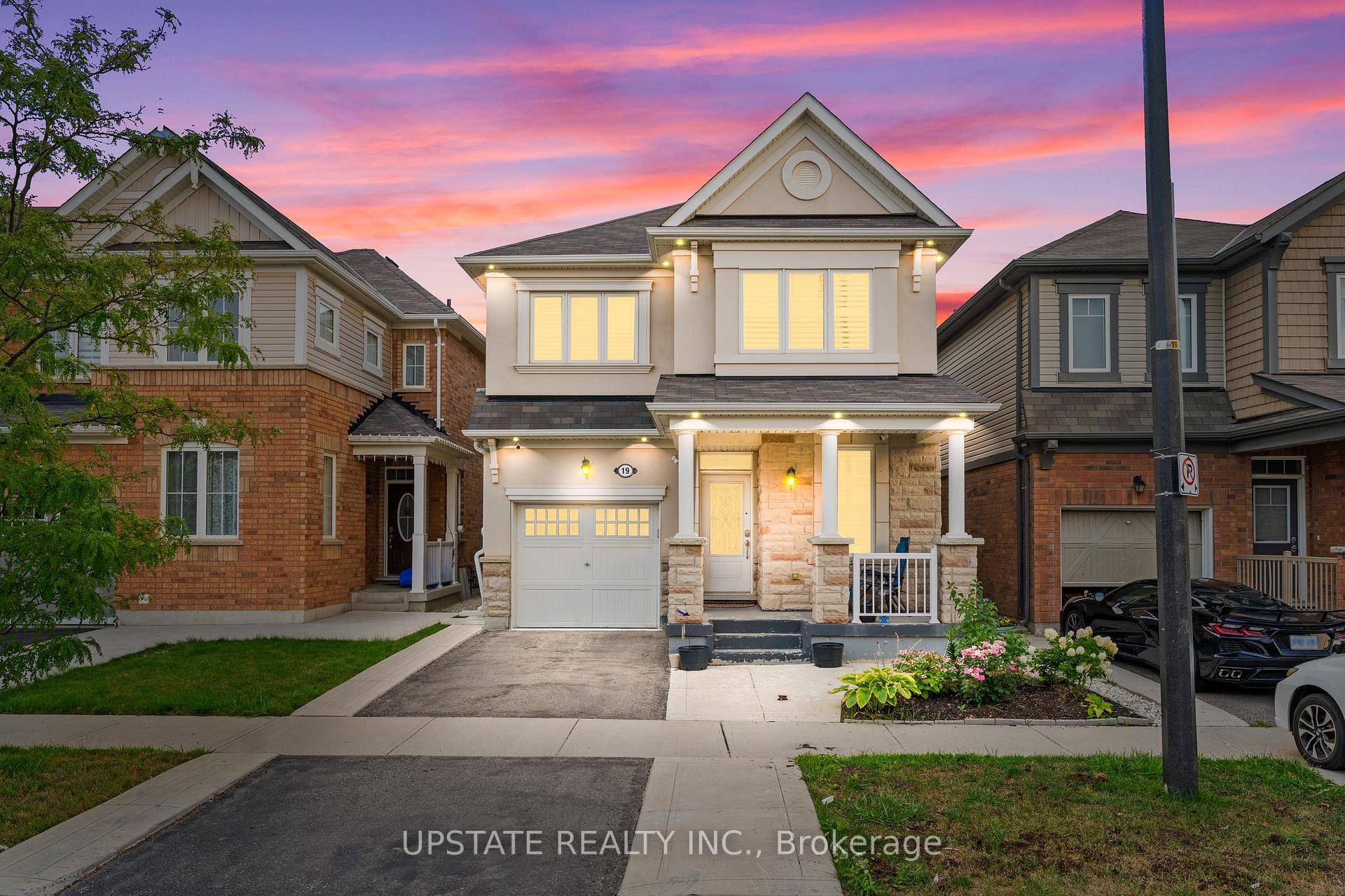 Bright amp ; Spacious Stone Stucco Home with a Welcoming Front Porch !